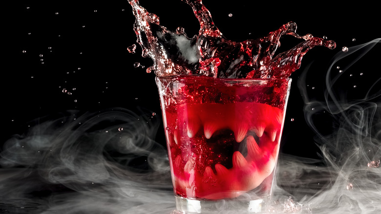 Vampire teeth in a cocktail