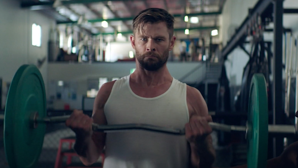 Chris Hemsworth lifting weights