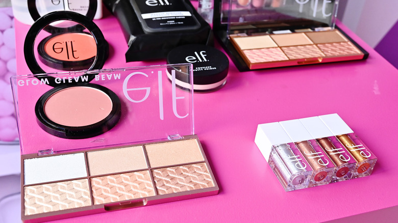 E.l.f cosmetics on bright pink surface