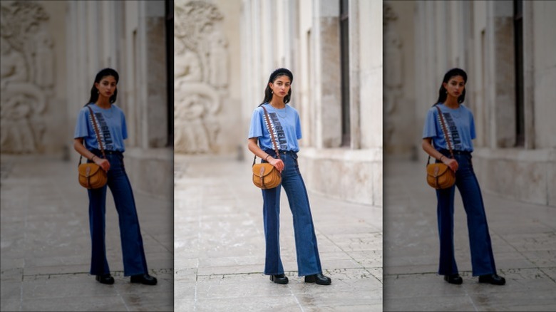 Woman wearing flared jeans