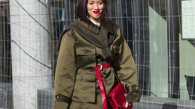 Model wearing green coat