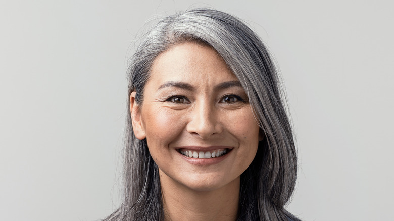 Woman with gray hair smiling