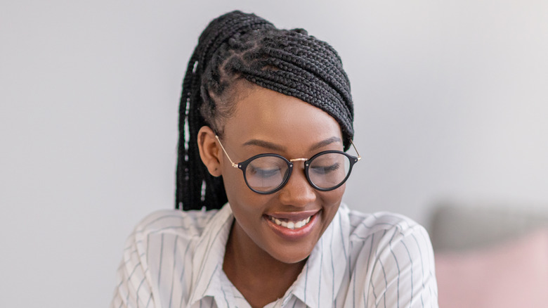 Woman wearing glasses smiling