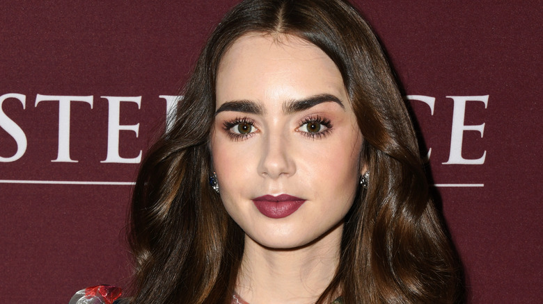 Lily Collins showing the 2020 makeup trend of bushy brows