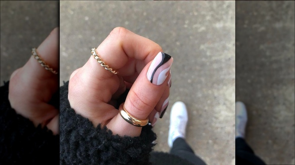 Pink, white, black swirly nails