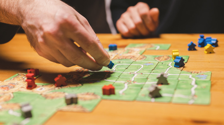 People playing a board game