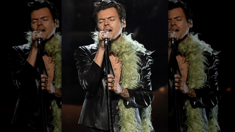 Harry Styles' most stylish moments: from pink feathers at Coachella to  black leather Gucci suits