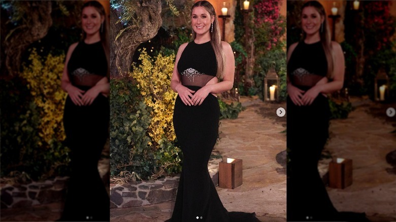 Rachel Recchia posing in black gown