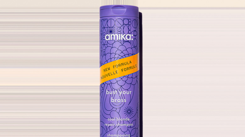 A bottle of Amika purple shampoo