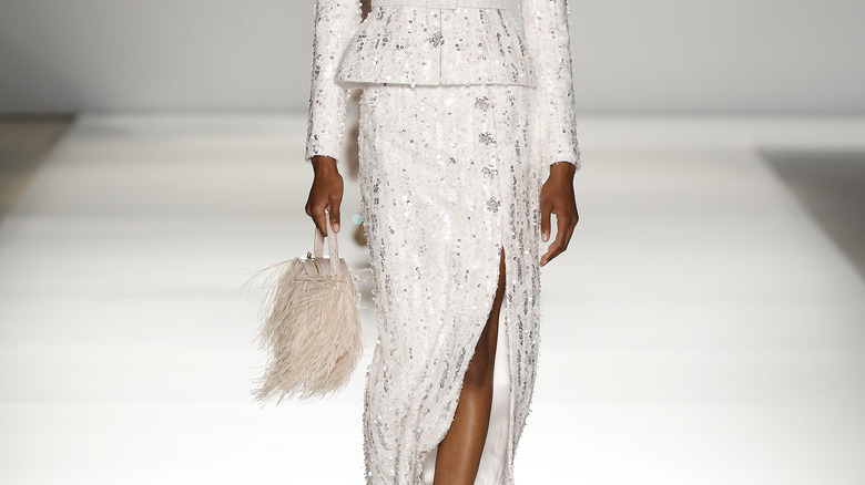 Feather circular purse runway show