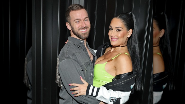 Artem Chigvintsev Nikki Bella hugging