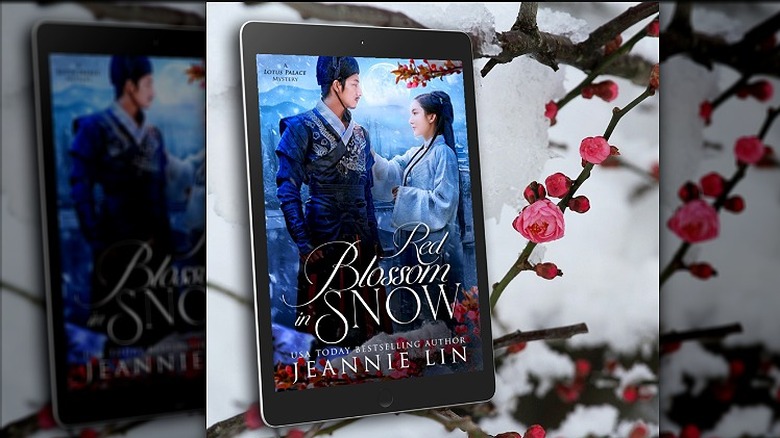 "Red Blossom in Snow" by Jeannie Lin on a tablet