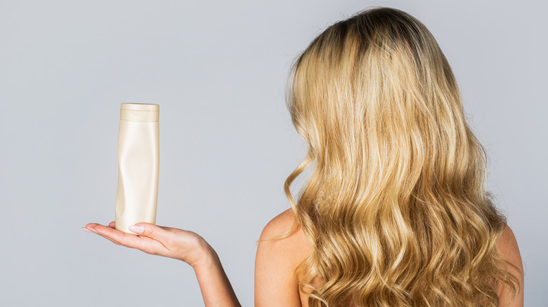 blonde woman with shampoo 