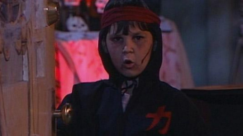 DJ at tunnel of terror in Roseanne Halloween episode boo