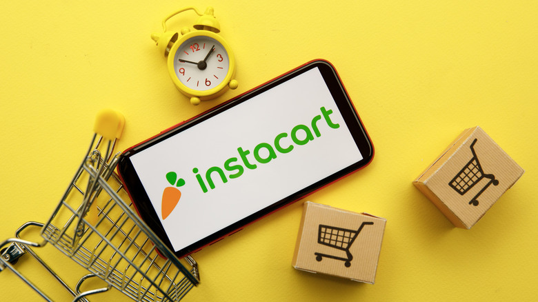 Phone loading Instacart for grocery delivery