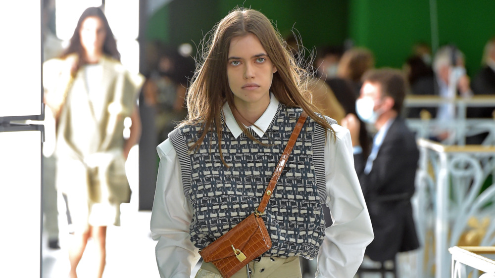 model wearing the sweater vest trend