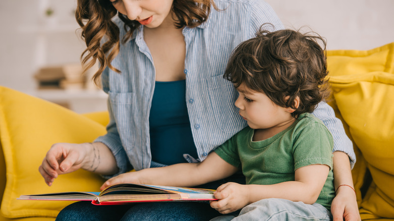 boy with mom and book