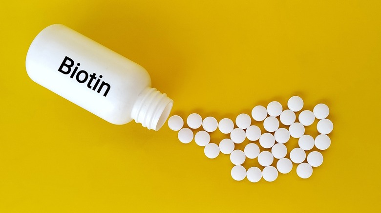 Bottle of Biotin supplements 