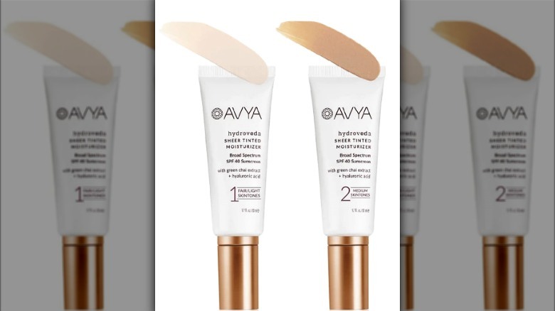 Two white tubes of tinted moisturizer