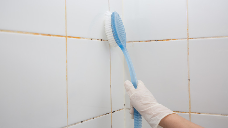 Scrubbing shower tiles