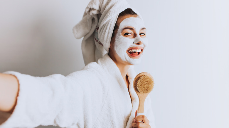 smiling woman with face mask