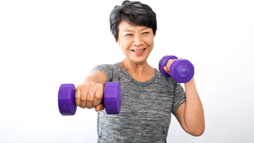 Woman working out with weights