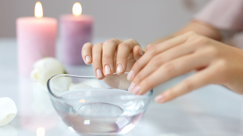 Soaking nails in a bowl 