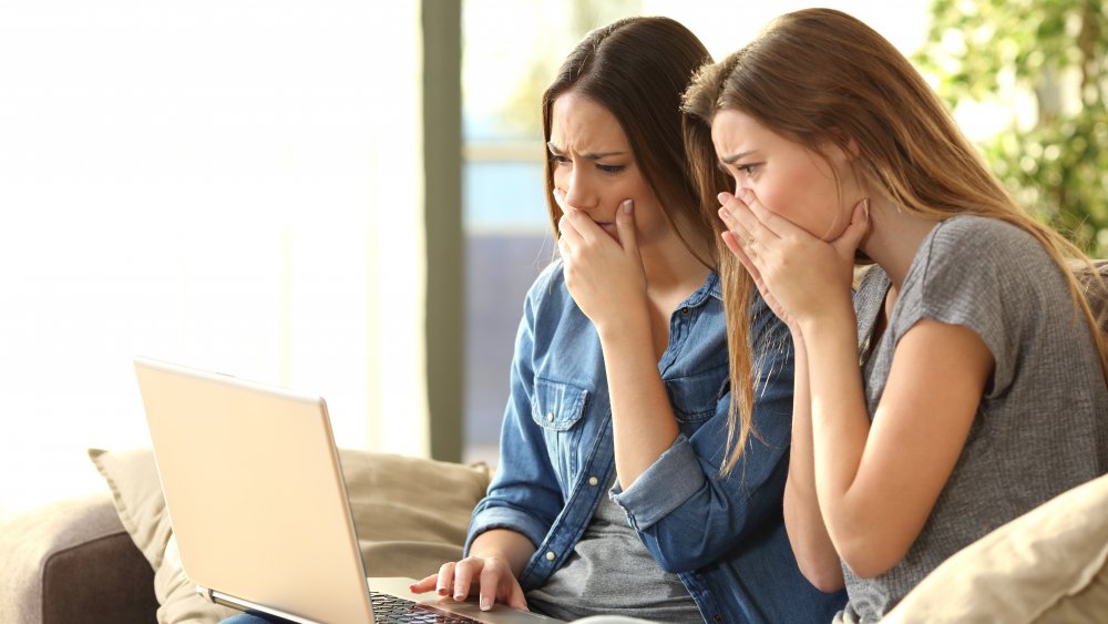 Anxious women looking at the computer