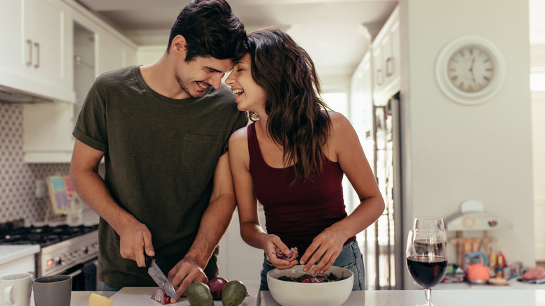 couple cooking together