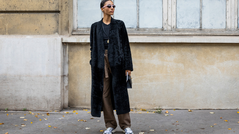 long black faux fur coat street style