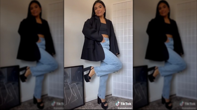 @anaalvarez posing in blazer and jeans