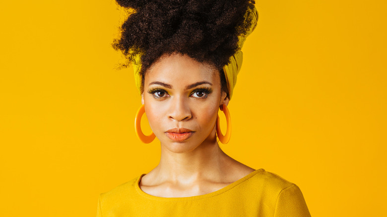 portrait of woman in yellow