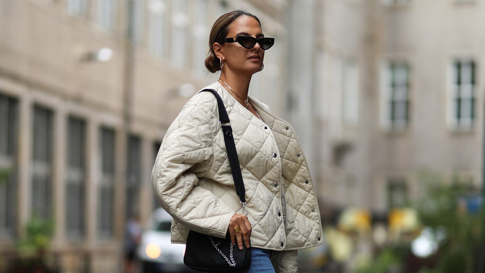 woman wearing quilted jacket