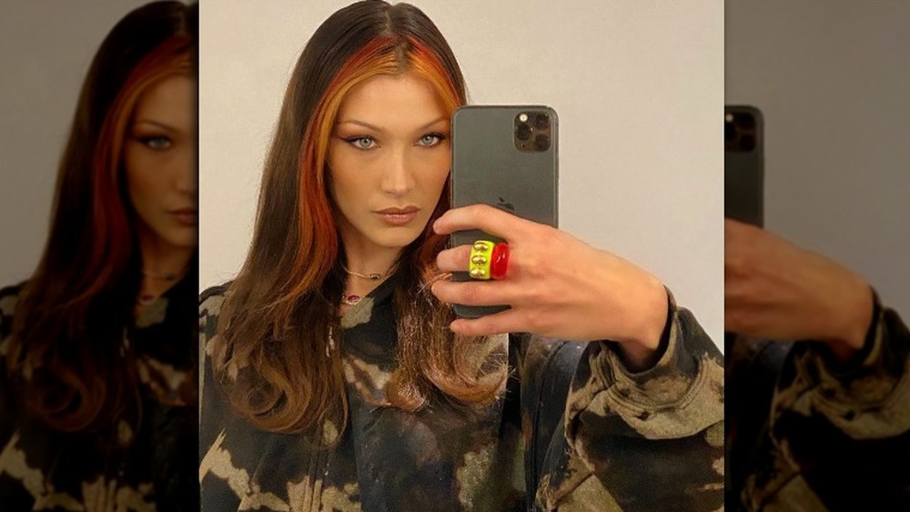 Bella Hadid taking a selfie