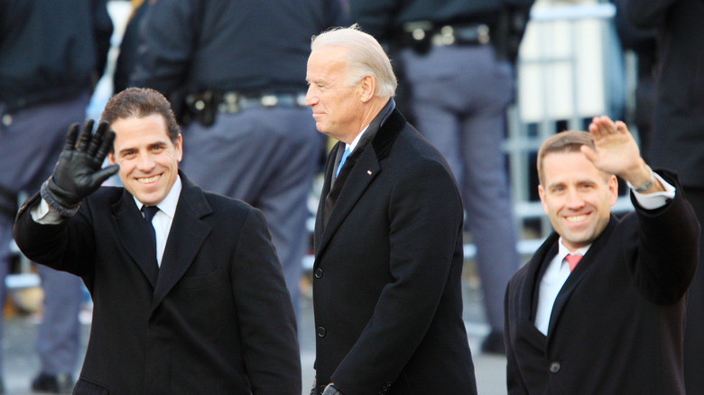 Joe Biden smiling with sons