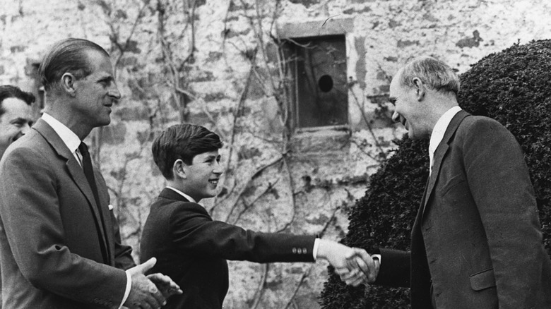 Prince Philip introducing King Charles III to Gordonstoun headmaster