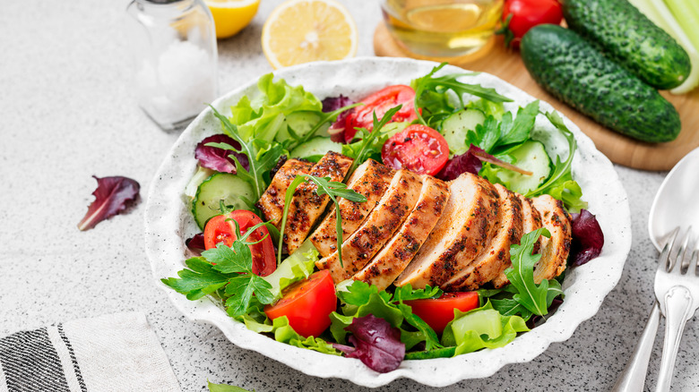 Grilled chicken salad in bowl