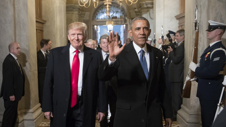 Donald Trump and Barack Obama walking