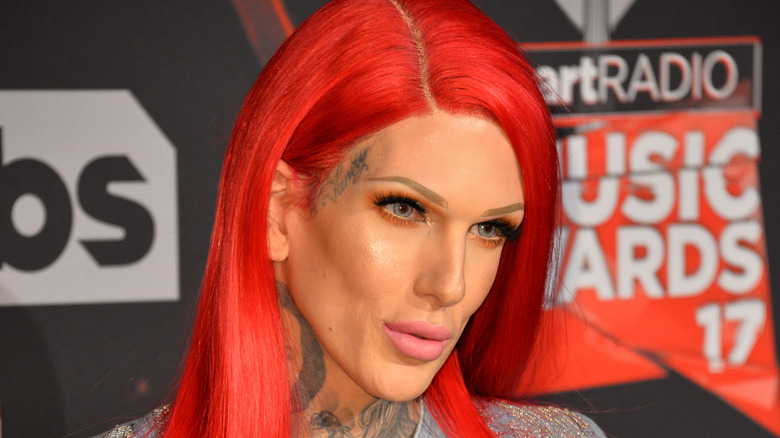 jeffree star in a red wig