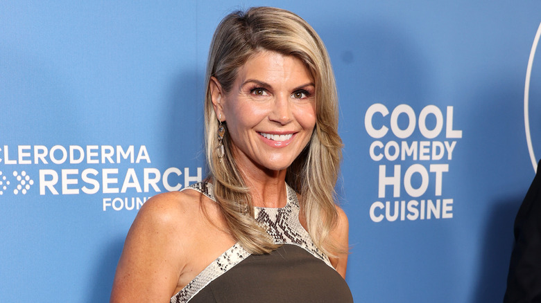 Lori Loughlin posing at event