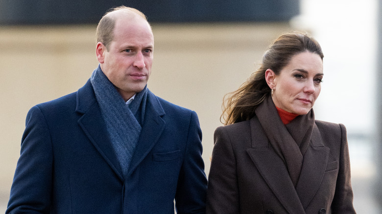 Prince William and Princess Catherine in coats and scarves