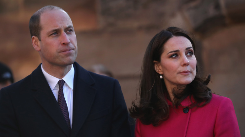 Prince William and Princess Catherine looking serious