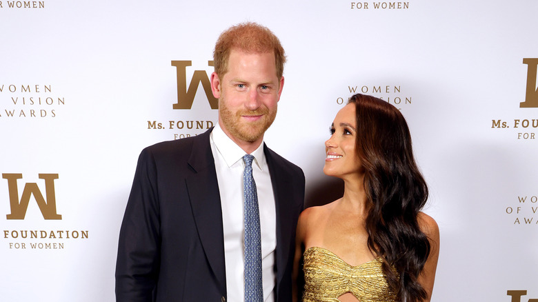 Harry and Meghan posing 