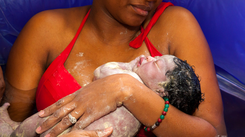 Woman with newborn baby