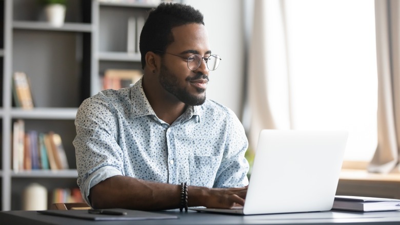 Man at his computer