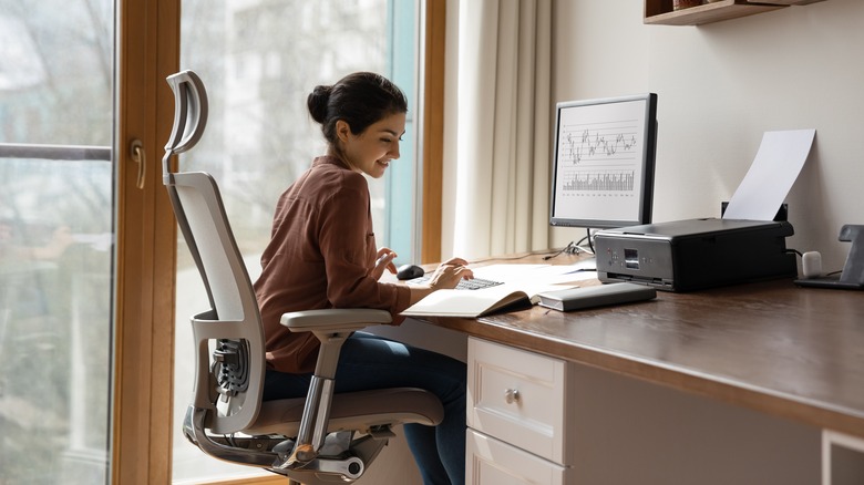 Woman at her work from home desk