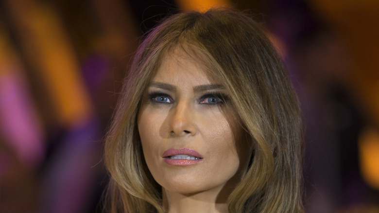 Melania Trump pink lipstick staring