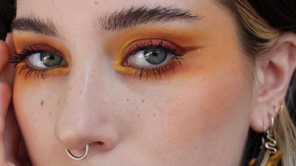 Woman wearing red eyeliner