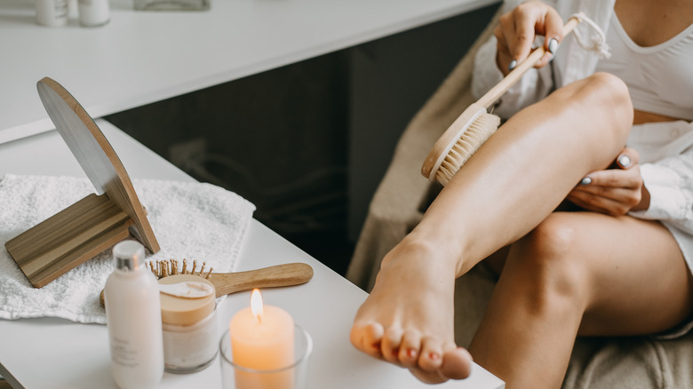 woman dry brushing