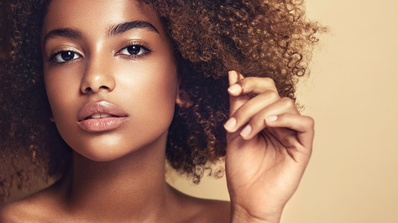 woman with curly afro hair